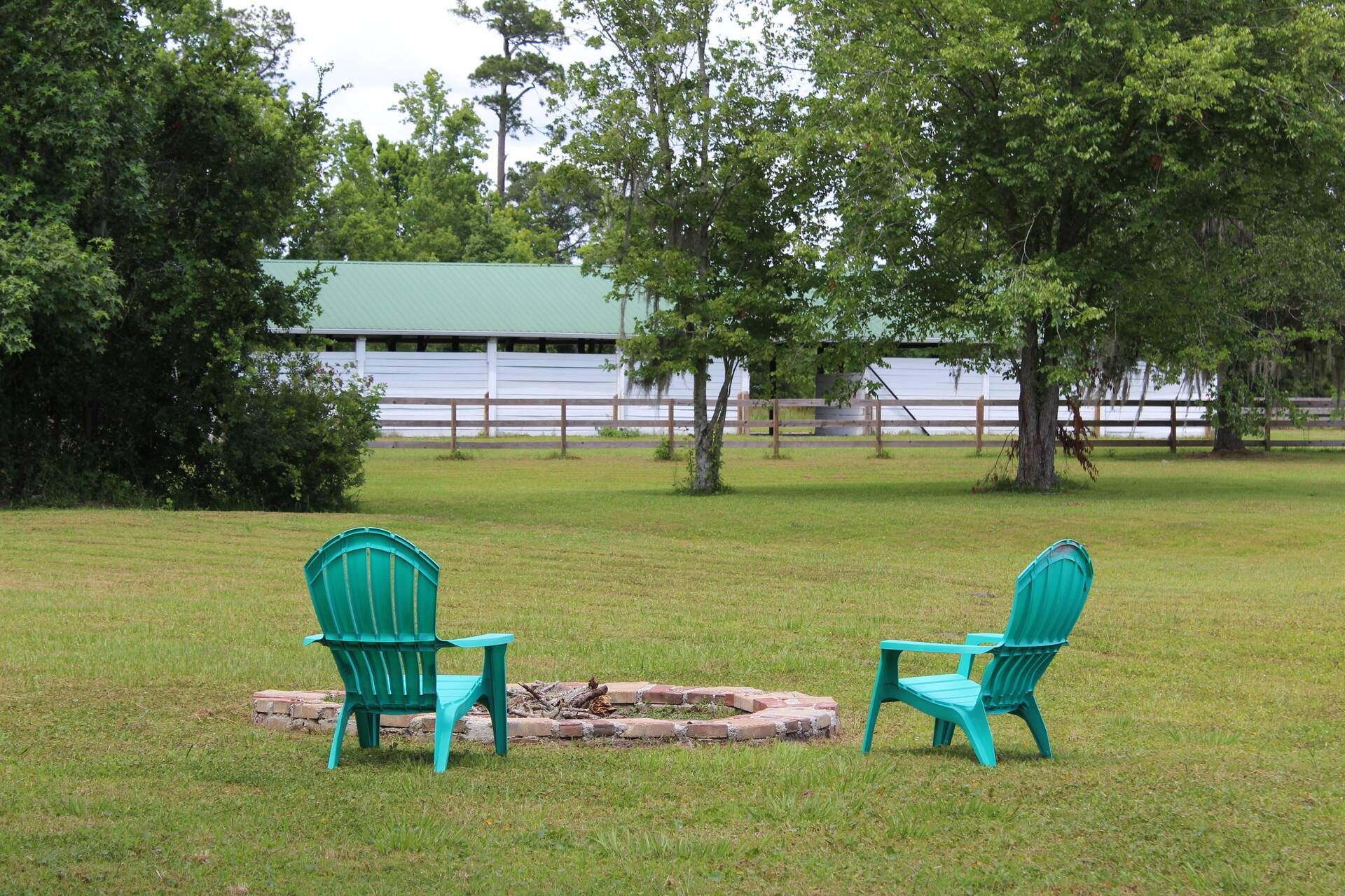 Fire pit seating by the pasture